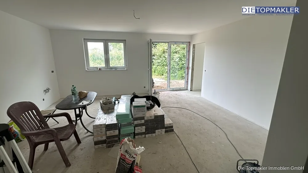 Moderne 4-Zimmer-Erdgeschosswohnung mit Terrasse | Erstbezug | WBS erforderlich - Wohnzimmer (86875)