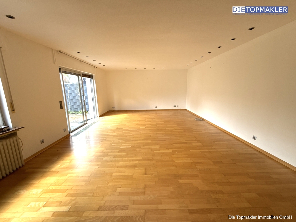 Großzügige Erdgeschoss Wohnung mit Garten - Wohnzimmer (83981)