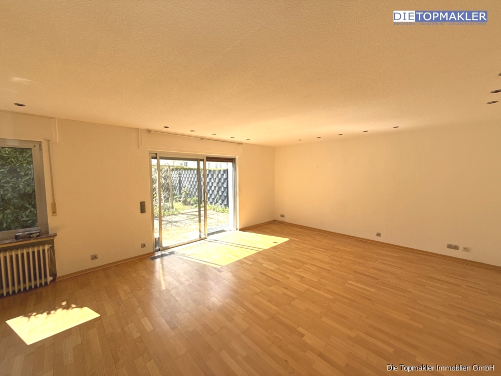 Großzügige Erdgeschoss Wohnung mit Garten - Wohnzimmer (83991)