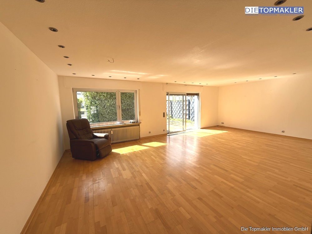 Großzügige Erdgeschoss Wohnung mit Garten - Wohnzimmer (83982)