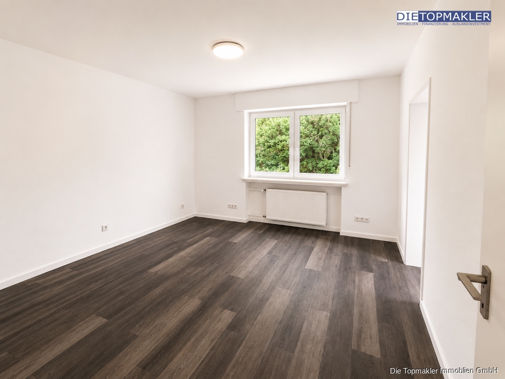 Einfamilienhaus mit 2 Einliegerwohnungen in der Südstadt - Wohnung Nr.2_Wohnen (85806)