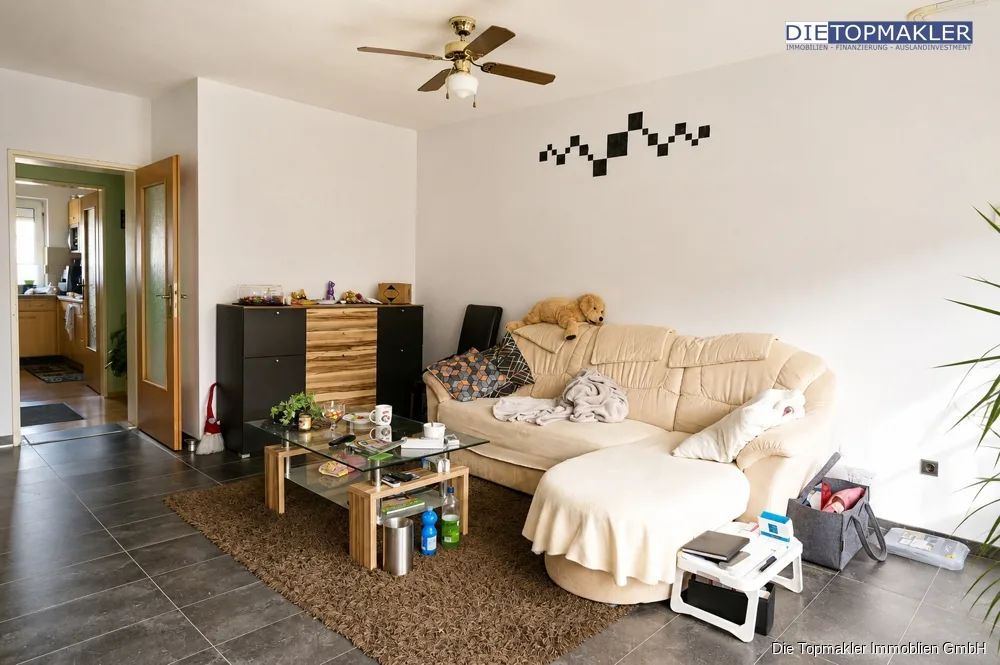 Kapitalanlage 8 Wohneinheiten in Extertal - Wohnzimmer WohnungNr.1. (86684)