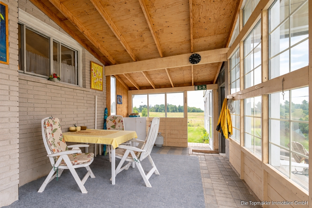 Einmalige Investitionschance in den 1000 Islands – Entwicklungsgrundstück mit Bestand - Wintergarten mit Blick ins Grüne (83339)