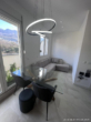 Titelbild - Moderne Design-Studiowohnung mit Bergblick