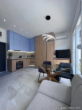 Bild - Moderne Design-Studiowohnung mit Bergblick