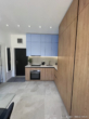 Bild - Moderne Design-Studiowohnung mit Bergblick